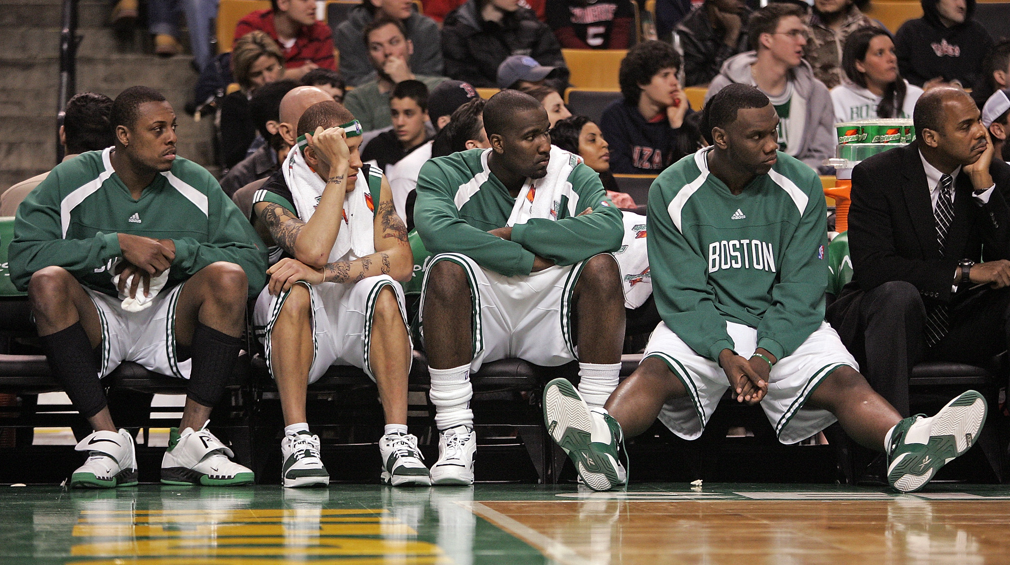(032307 Cambridge, MA) Boston Celtic Captain Paul Pierce, Boston Celtic Guard Delonte West , Boston Celtic Center Kendrick Perkins and Boston Celtic Center Al Jefferson watch in dejection during the final moments as the Boston Celtics take on the Da (032307 Cambridge, MA) Boston Celtic Captain Paul Pierce, Boston Celtic Guard Delonte West , Boston Celtic Center Kendrick Perkins and Boston Celtic Center Al Jefferson watch in dejection during the final moments as the Boston Celtics take on the Da