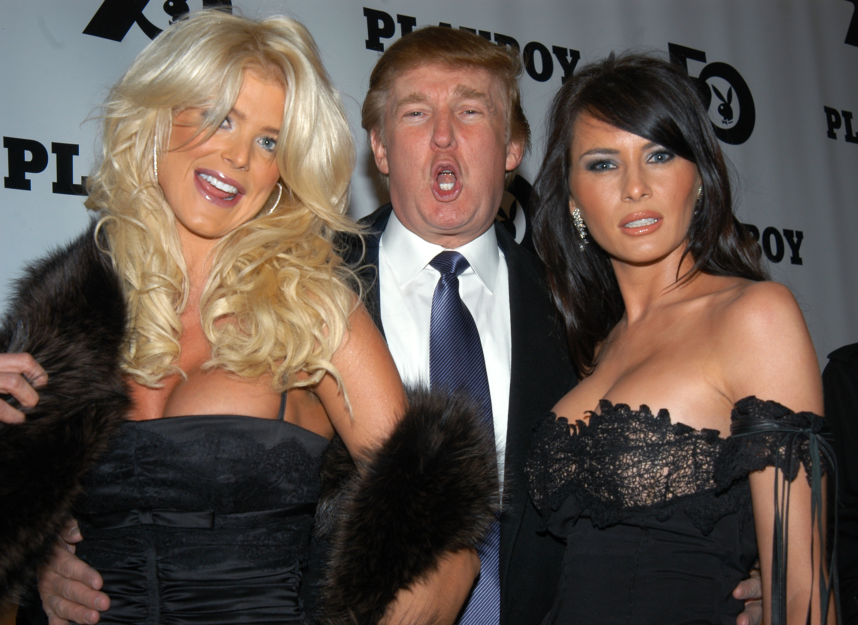 Donald Trump is flanked by Victoria Silvstedt, 1997 Playmate Donald Trump is flanked by Victoria Silvstedt, 1997 Playmate